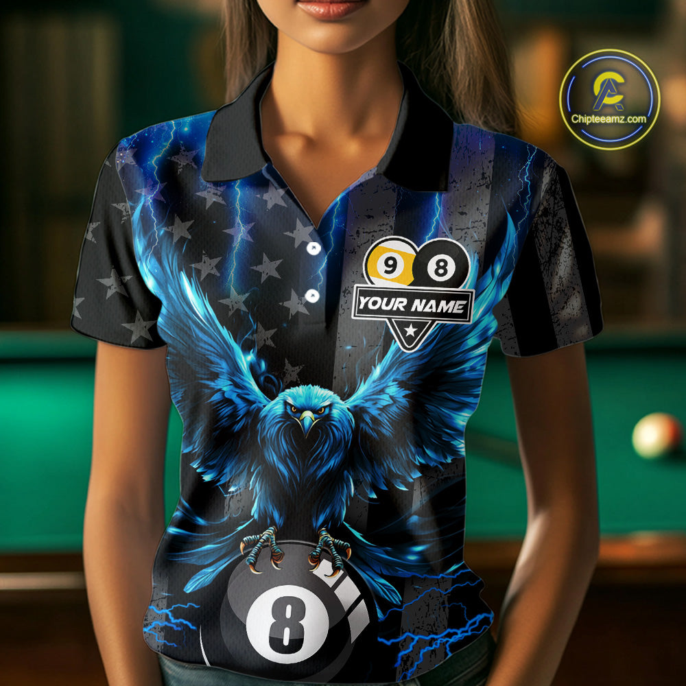 Woman wearing a blue lightning eagle billiard jersey beside a pool table front view.