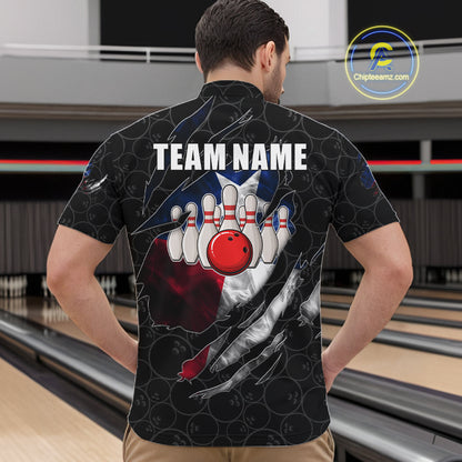 Back view of man wearing a smoke Texas flag black bowling quarter zip shirt in a bowling alley.