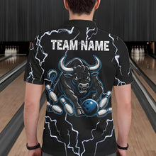 Load image into Gallery viewer, Back view of man wearing a blue bull lightning bowling polo shirt inside a bowling alley.