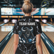 Load image into Gallery viewer, Back view of woman wearing a blue bull lightning bowling polo shirt inside a bowling alley.