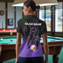 Load image into Gallery viewer, Back view of woman wearing a purple grim reaper lightning 9 ball pool shirt in a billiards hall.