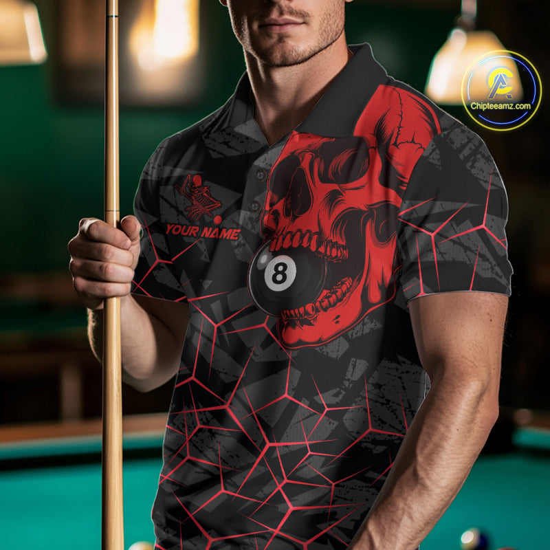 Man wearing a red skull billiard jersey beside a pool table front view.