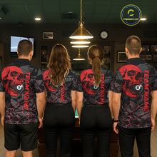 Load image into Gallery viewer, Back view of pool players wearing custom red skull billiard shirts in a game room.