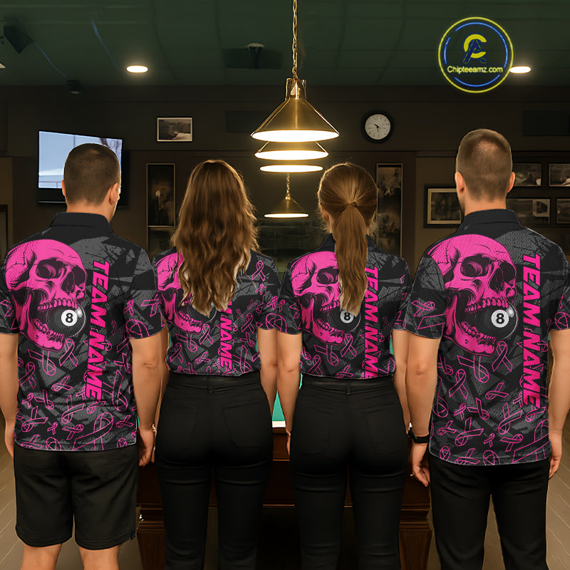 Back view of pool players wearing breast cancer awareness billiard shirts in a game room.