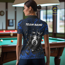 Load image into Gallery viewer, Back view of woman wearing a blue crack pool shirt in a billiards hall.