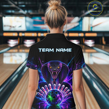 Load image into Gallery viewer, Back view of woman wearing a neon cobra bowling polo shirt inside a bowling alley.