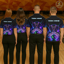 Load image into Gallery viewer, Back view of bowling team wearing matching neon cobra bowling shirts in a bowling alley.