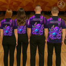 Load image into Gallery viewer, Back view of bowling team wearing matching neon octopus bowling shirts in a bowling alley.