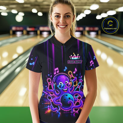 Woman wearing a neon octopus music bowling quarter zip jersey during tournament play front view.