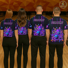 Load image into Gallery viewer, Back view of bowling team wearing matching neon octopus bowling shirts in a bowling alley.