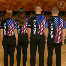 Load image into Gallery viewer, Back view of bowling team wearing matching patriotic bowling shirts in a bowling alley.