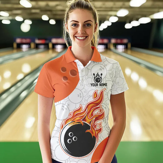 Woman wearing custom orange and white with flames design bowling polo shirt, front view mockup with your name design.